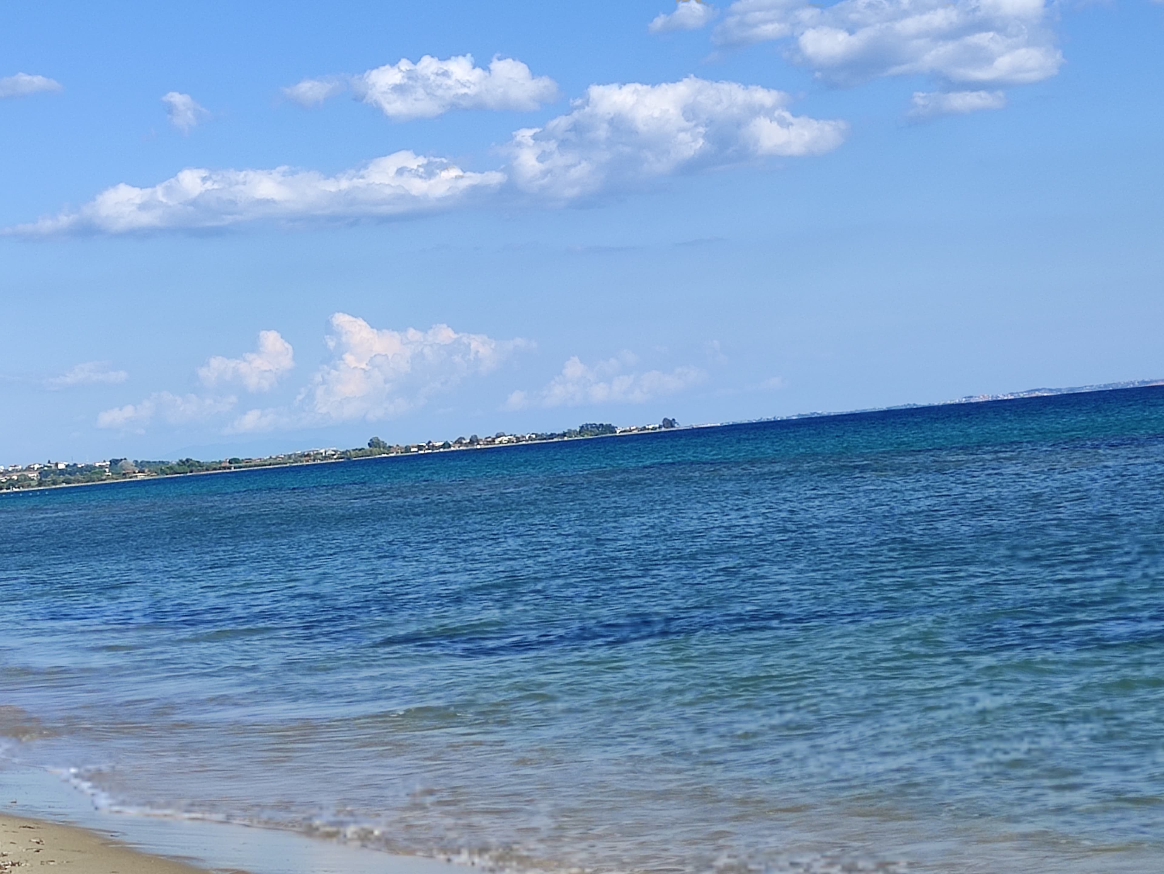 Open shoreline and summer sea